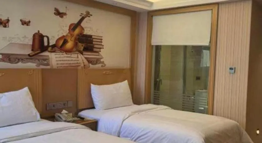 Bed in Vienna Hotel Hunan Jishou Fenghuang Ancient City