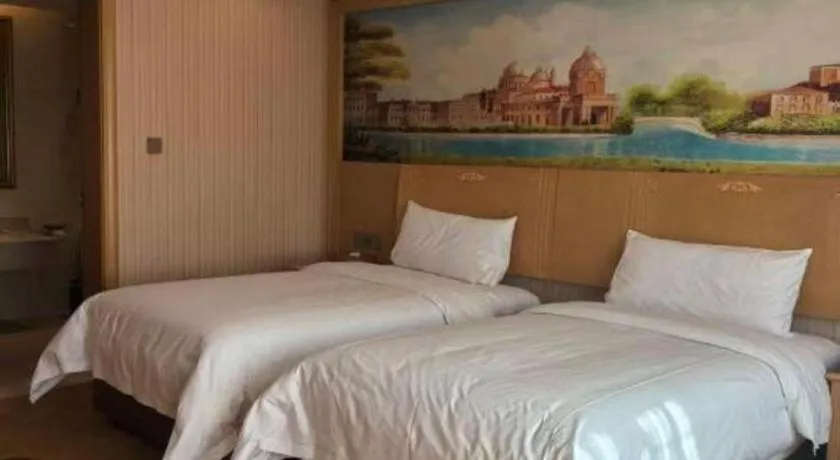 Bed in Vienna Hotel Hunan Jishou Fenghuang Ancient City