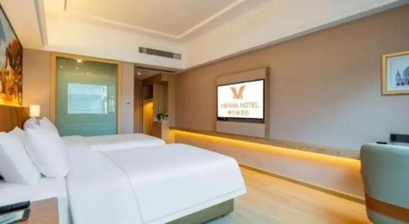 Bed in Vienna Hotel Hunan Jishou Fenghuang Ancient City