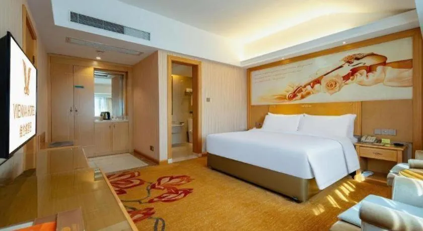 Bed in Vienna Hotel Hunan Jishou Fenghuang Ancient City