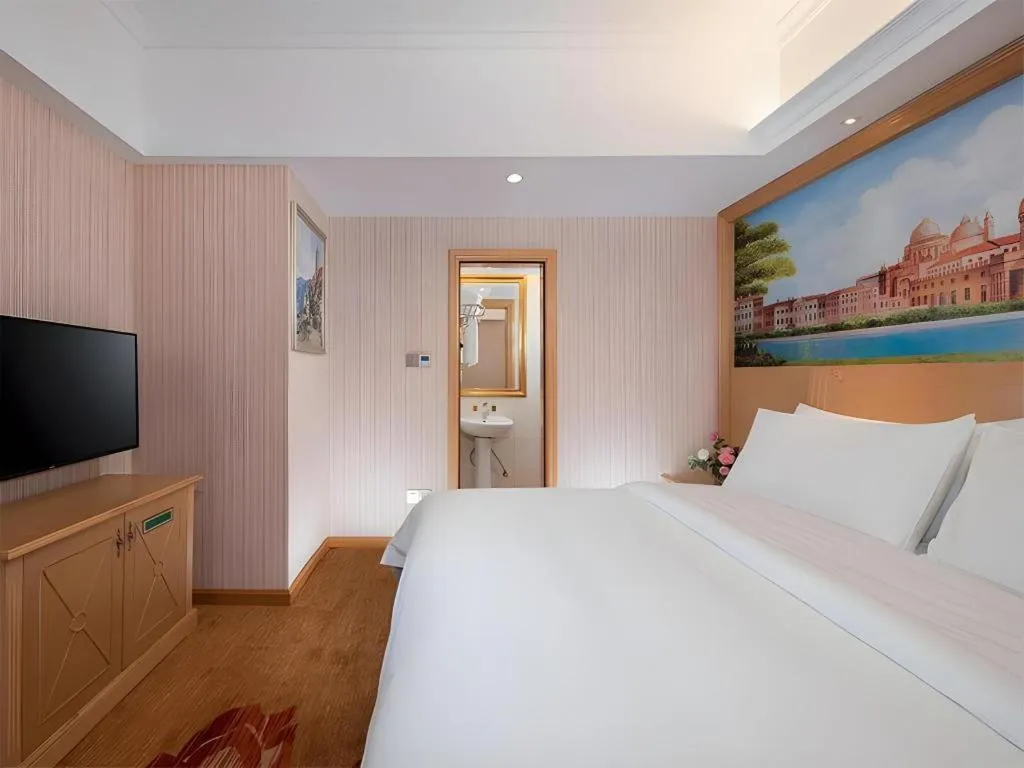 Bed in Vienna Hotel Hunan Jishou Fenghuang Ancient City