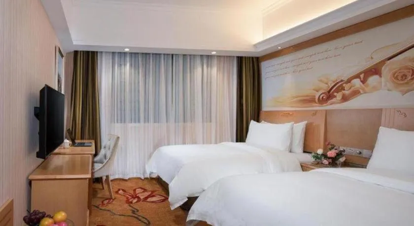 Bed in Vienna Hotel Hunan Jishou Fenghuang Ancient City