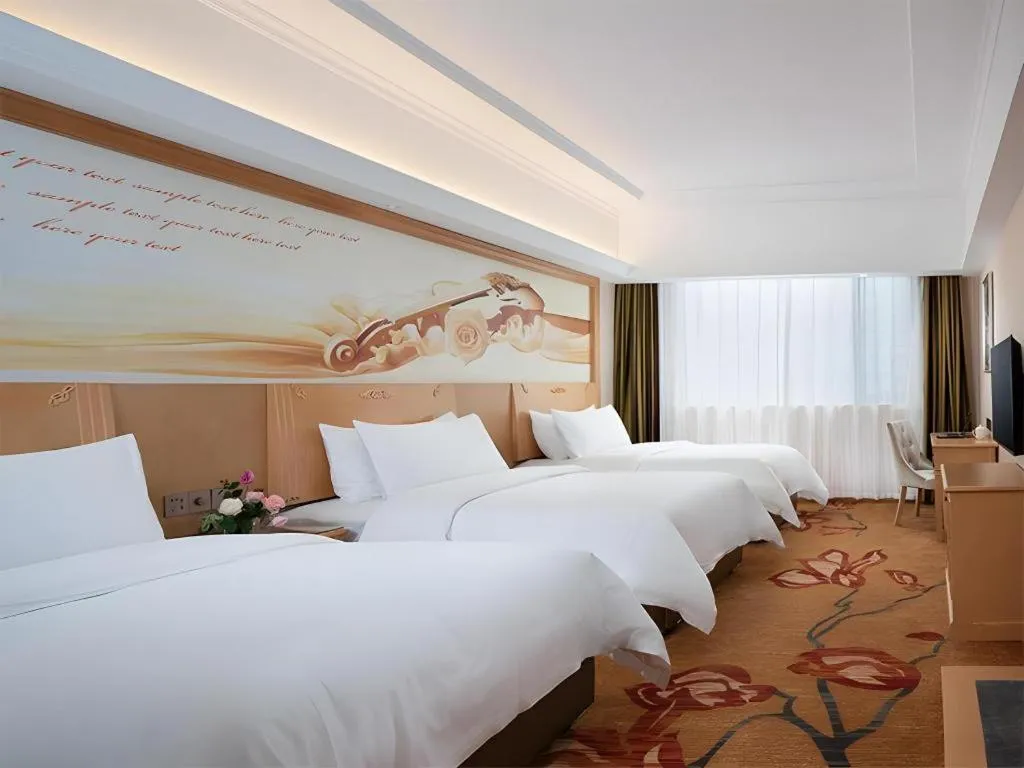 Bed in Vienna Hotel Hunan Jishou Fenghuang Ancient City