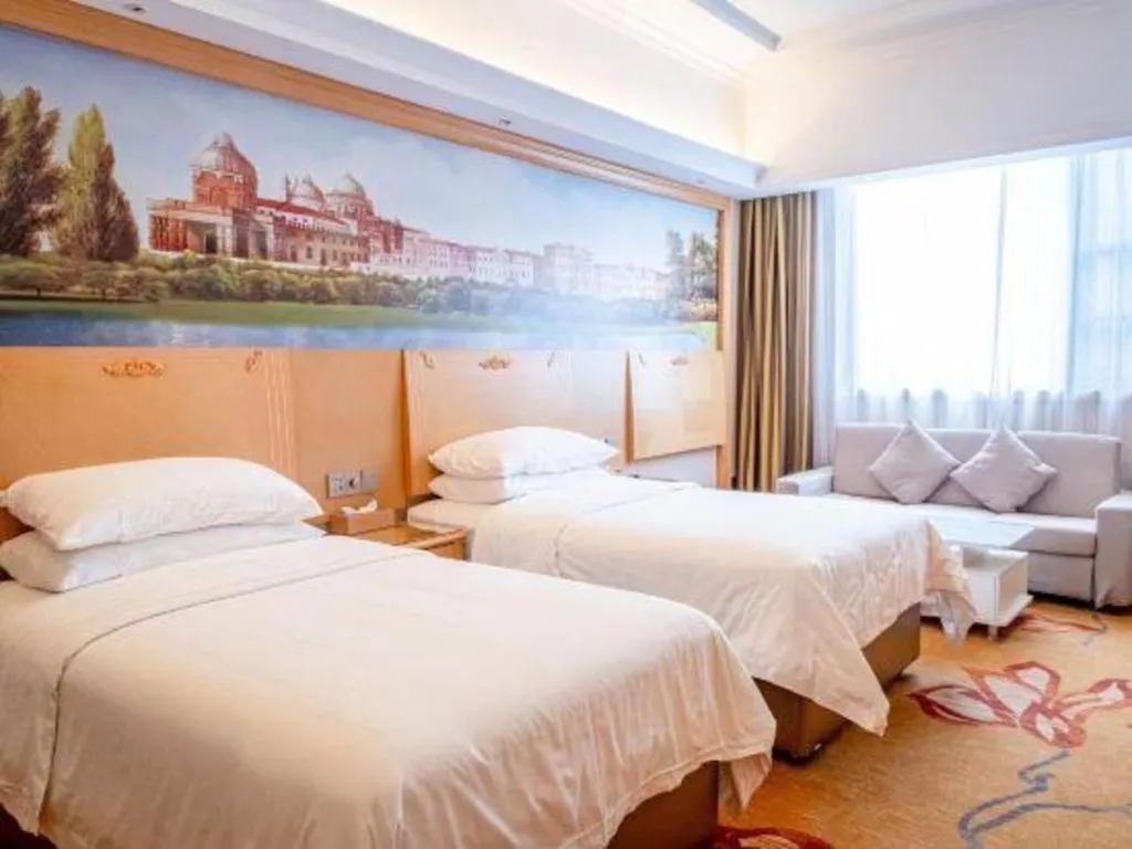 Bed in Vienna Hotel Hunan Jishou Fenghuang Ancient City