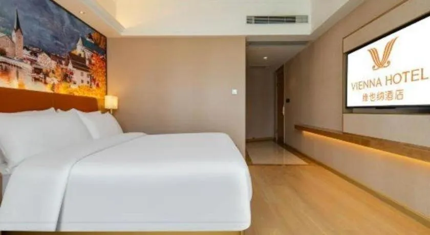 Bed in Vienna Hotel Hunan Jishou Fenghuang Ancient City