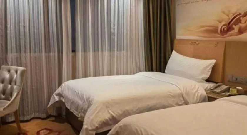 Bed in Vienna Hotel Hunan Jishou Fenghuang Ancient City