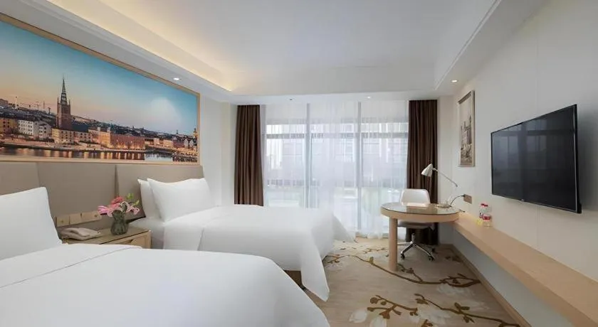 Bed in Vienna Hotel Guangdong Shantou Chaoyang Heping