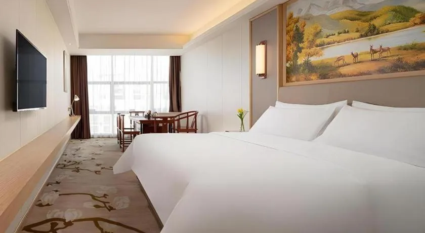 Bed in Vienna Hotel Guangdong Shantou Chaoyang Heping