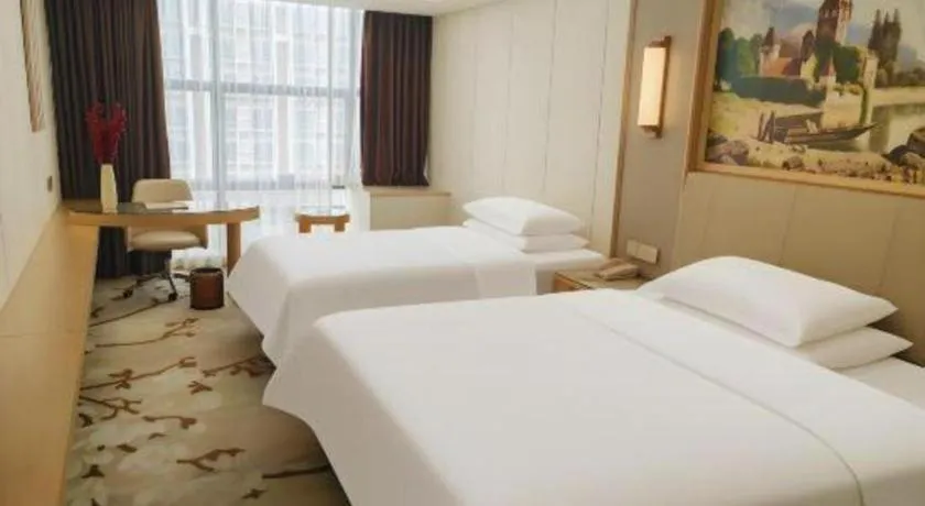 Bed in Vienna Hotel Guangdong Shantou Chaoyang Heping