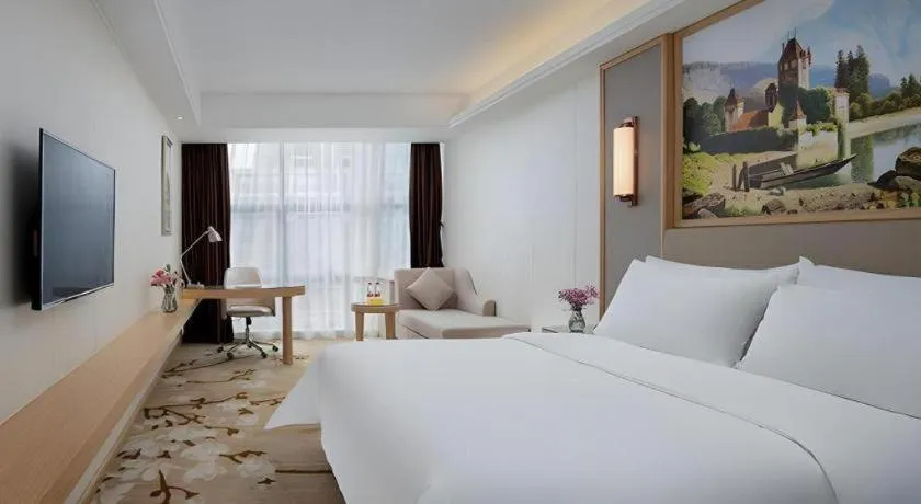 Bed in Vienna Hotel Guangdong Shantou Chaoyang Heping