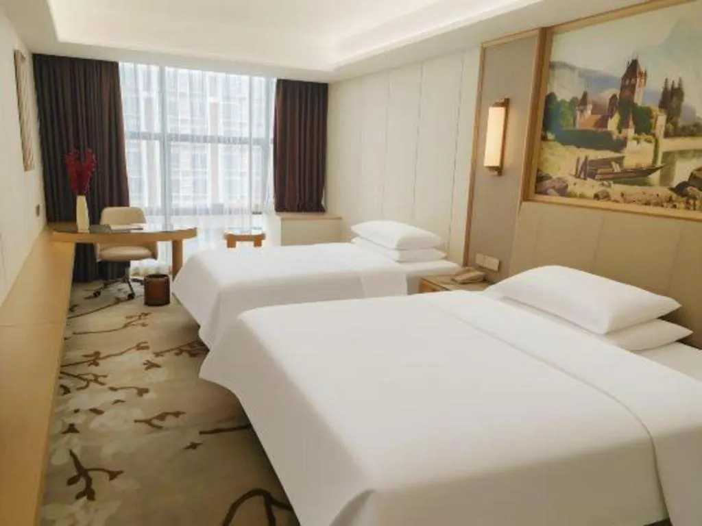 Bed in Vienna Hotel Guangdong Shantou Chaoyang Heping