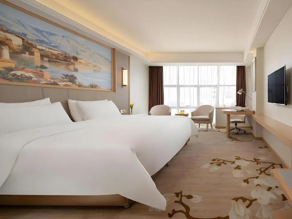 Bed in Vienna Hotel Guangdong Shantou Chaoyang Heping