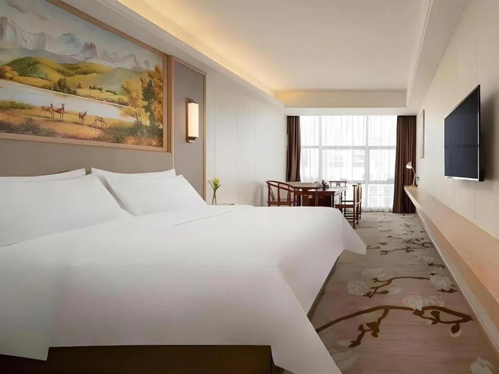 Bed in Vienna Hotel Guangdong Shantou Chaoyang Heping