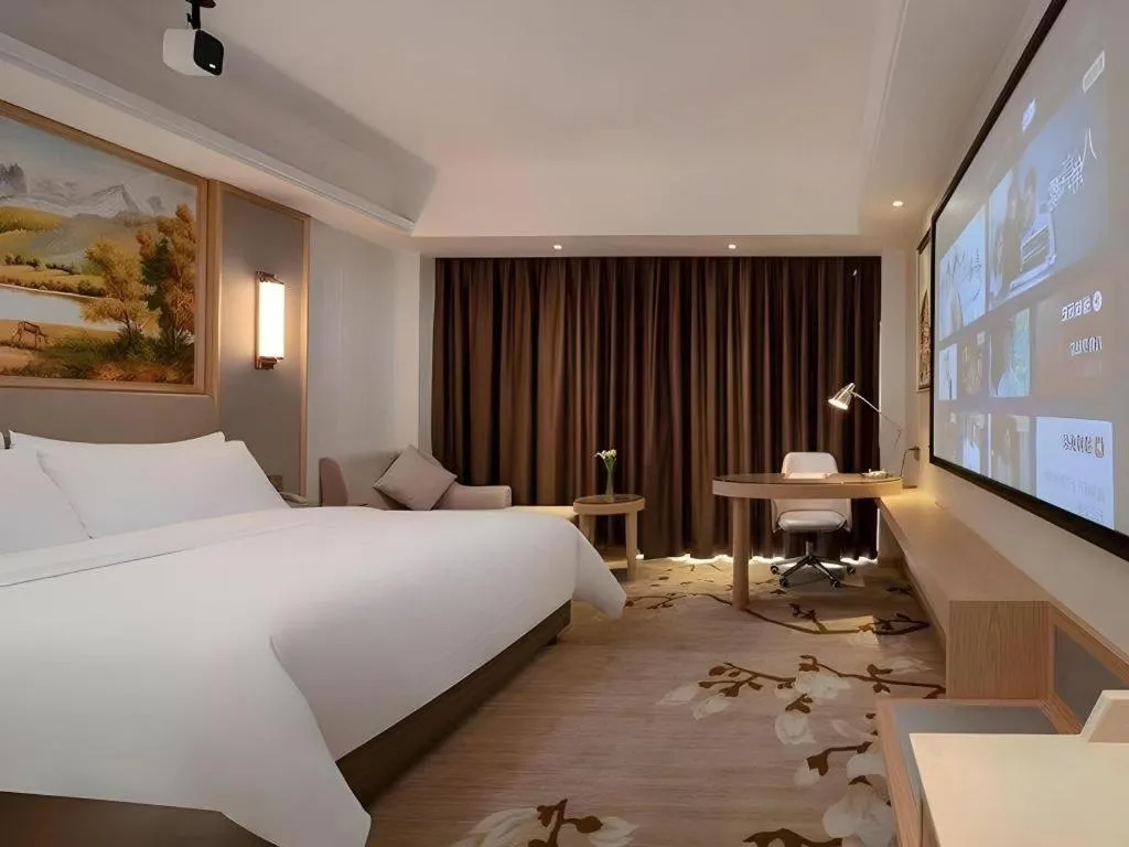 Bed in Vienna Hotel Guangdong Shantou Chaoyang Heping