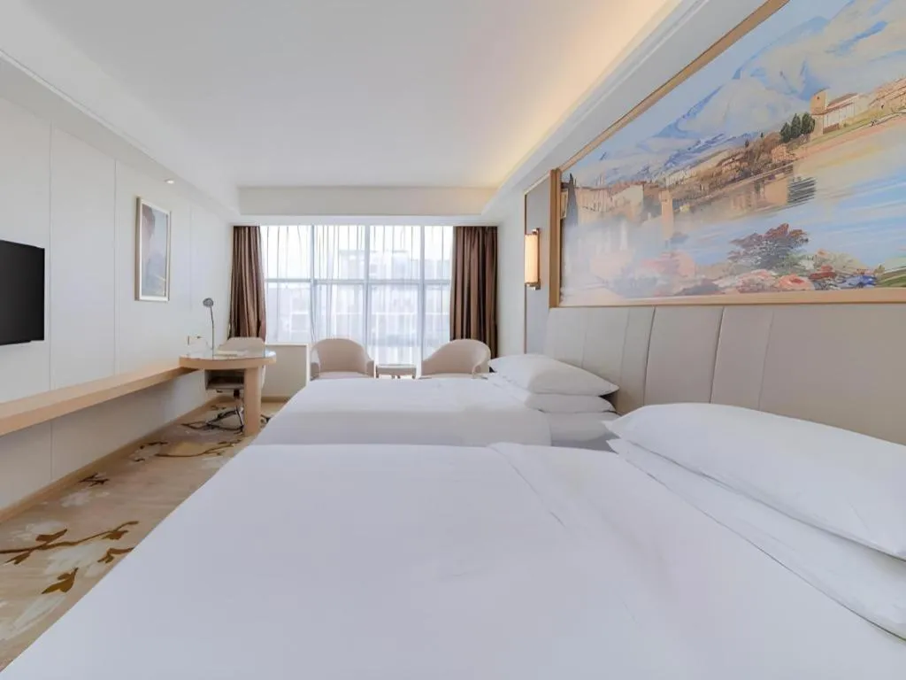 Bed in Vienna Hotel Guangdong Shantou Chaoyang Heping