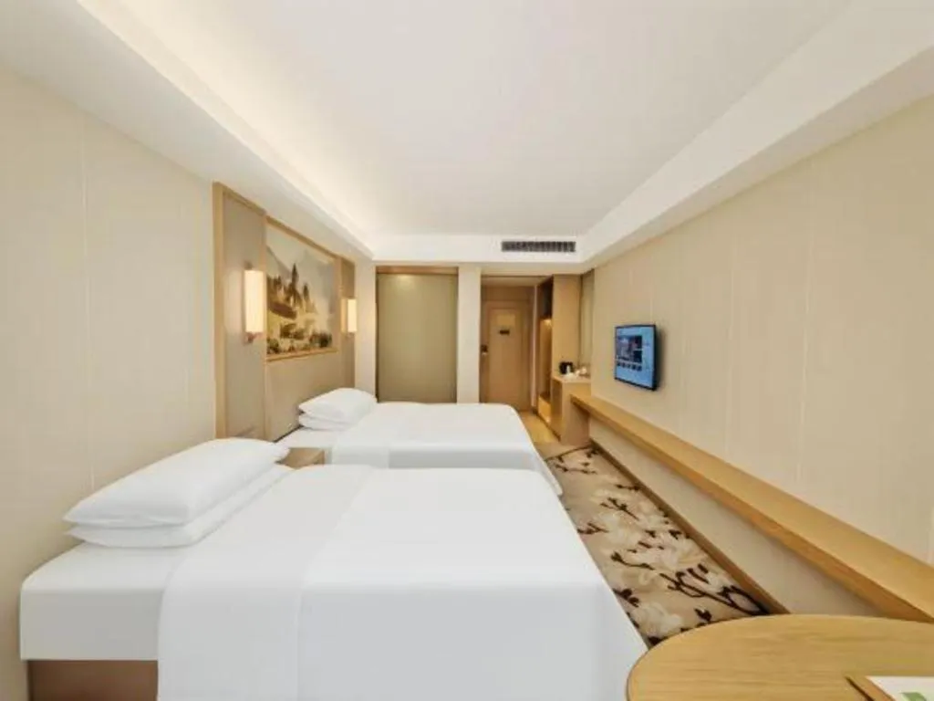 Bed in Vienna Hotel Guangdong Shantou Chaoyang Heping