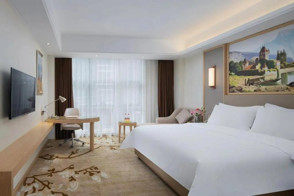 Bed in Vienna Hotel Guangdong Shantou Chaoyang Heping