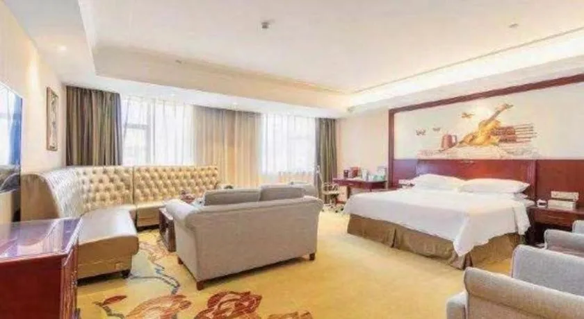 Bed in Vienna Hotel Guangdong Zhongshan Ancient Town Lighting Expo Center