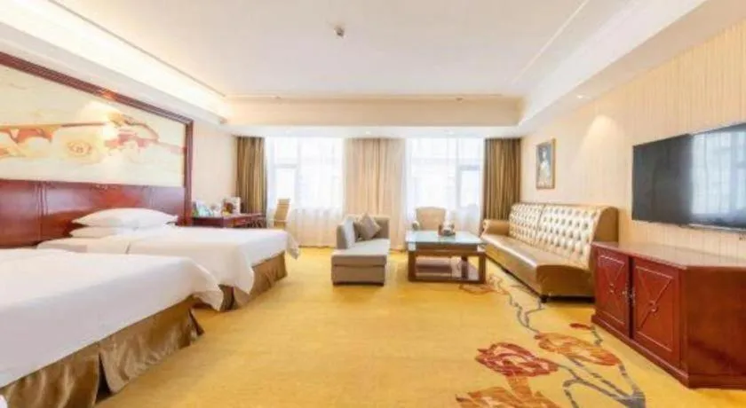 Bed in Vienna Hotel Guangdong Zhongshan Ancient Town Lighting Expo Center