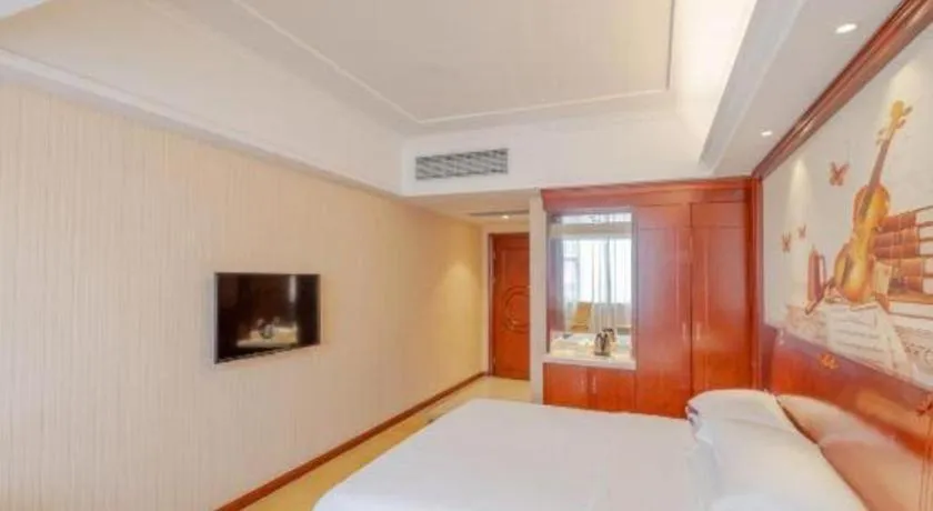 Bed in Vienna Hotel Guangdong Zhongshan Ancient Town Lighting Expo Center