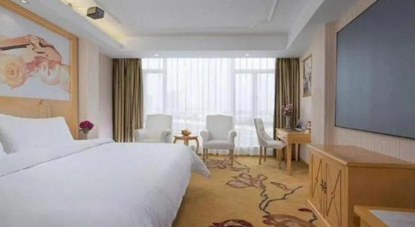 Bed in Vienna Hotel Guangdong Zhongshan Ancient Town Lighting Expo Center