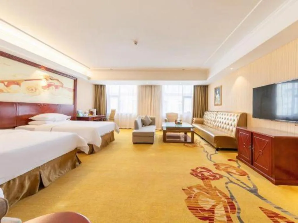 Bed in Vienna Hotel Guangdong Zhongshan Ancient Town Lighting Expo Center