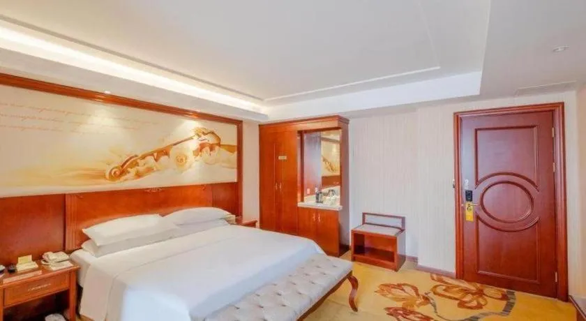 Bed in Vienna Hotel Guangdong Zhongshan Ancient Town Lighting Expo Center