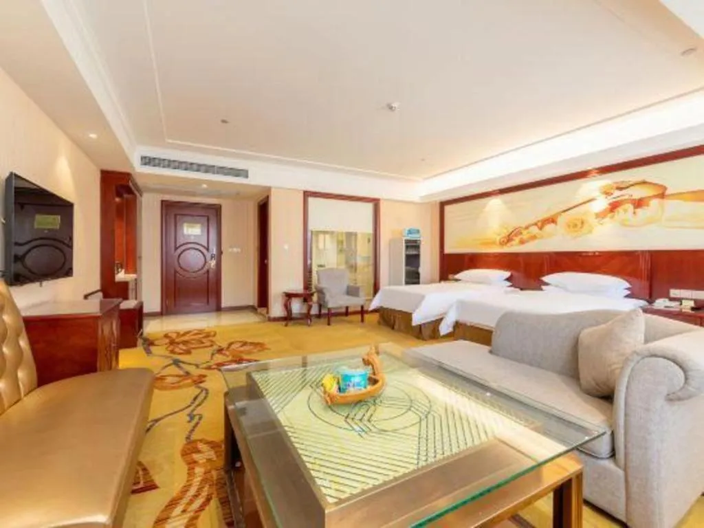 Bed in Vienna Hotel Guangdong Zhongshan Ancient Town Lighting Expo Center