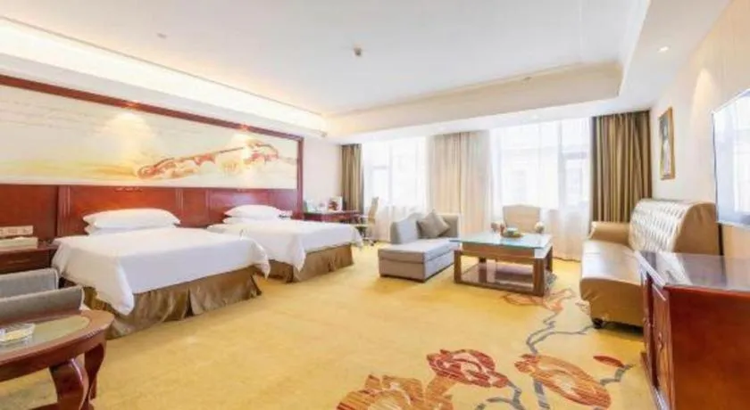 Bed in Vienna Hotel Guangdong Zhongshan Ancient Town Lighting Expo Center