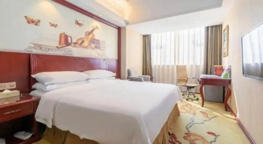 Bed in Vienna Hotel Guangdong Zhongshan Ancient Town Lighting Expo Center