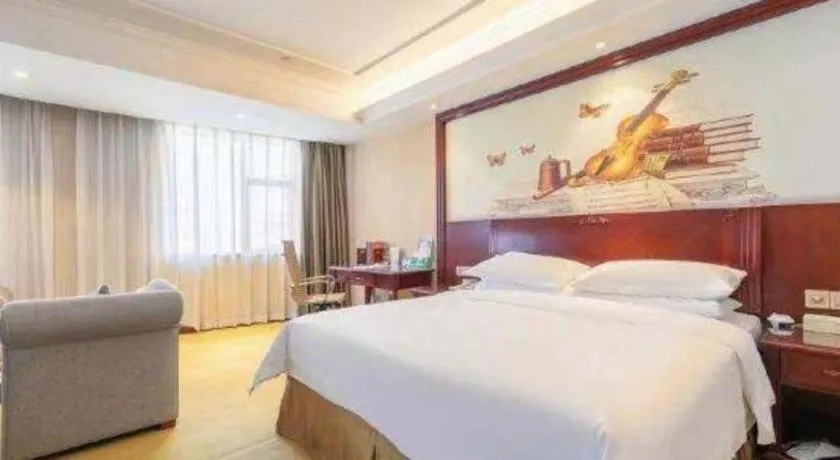 Bed in Vienna Hotel Guangdong Zhongshan Ancient Town Lighting Expo Center