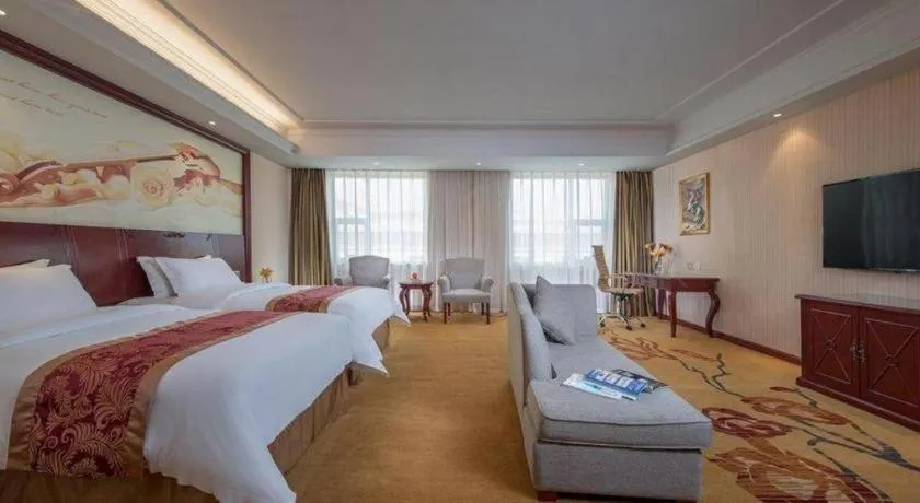 Bed in Vienna Hotel Guangdong Zhongshan Ancient Town Lighting Expo Center