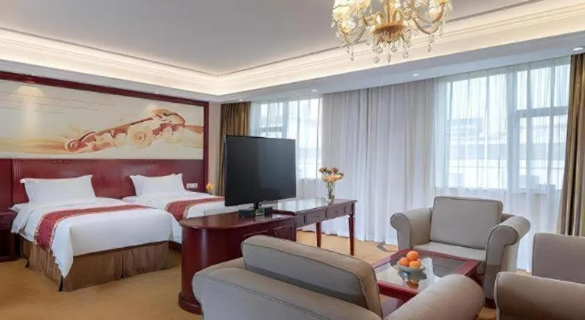 Bed in Vienna Hotel Guangdong Zhongshan Ancient Town Lighting Expo Center