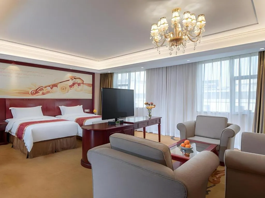 Bed in Vienna Hotel Guangdong Zhongshan Ancient Town Lighting Expo Center