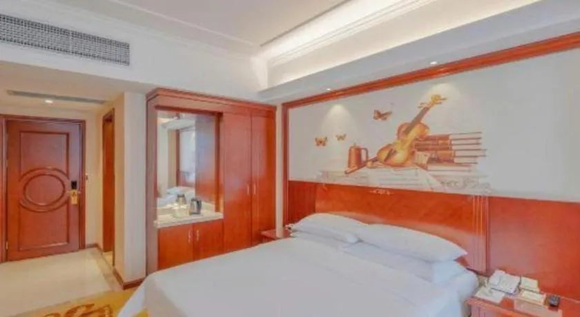 Bed in Vienna Hotel Guangdong Zhongshan Ancient Town Lighting Expo Center