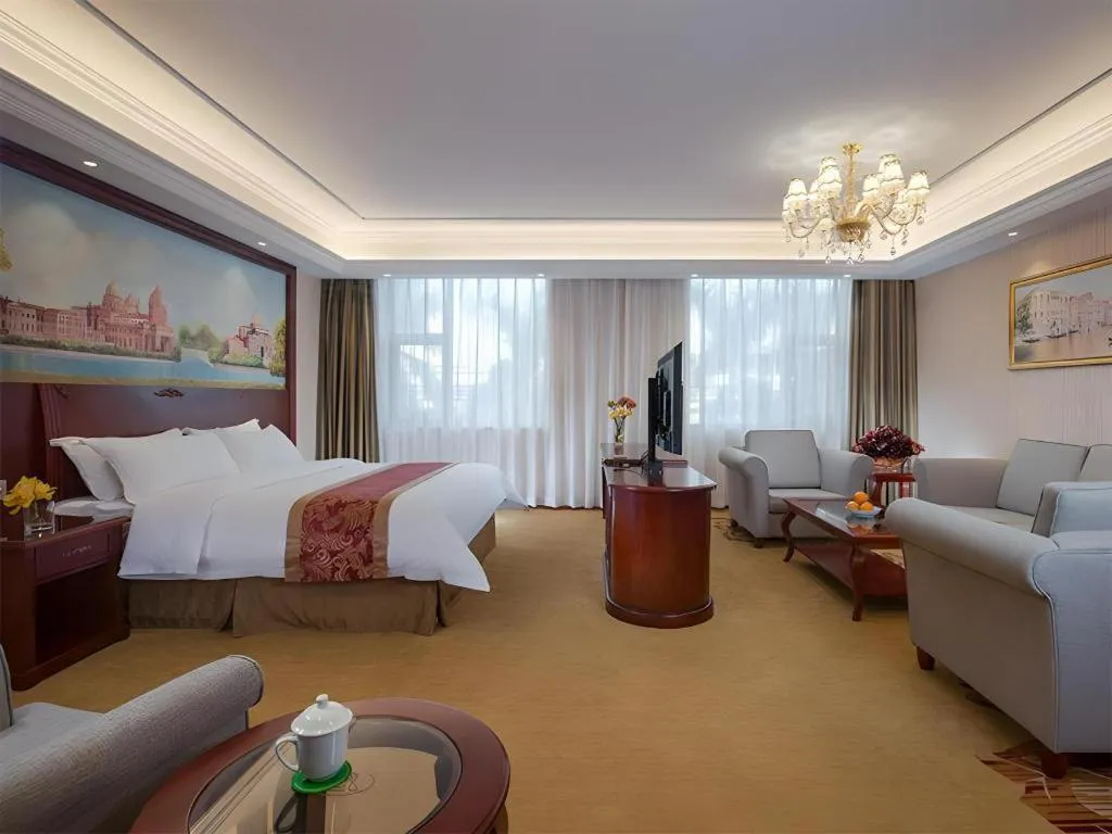 Bed in Vienna Hotel Guangdong Zhongshan Ancient Town Lighting Expo Center