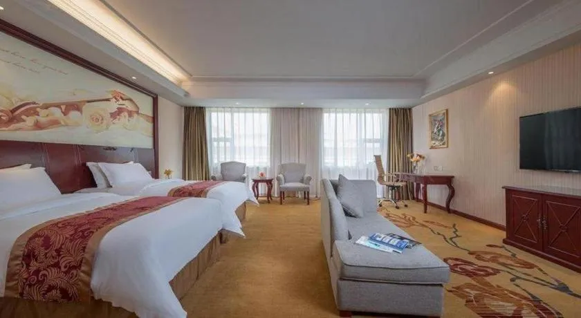 Bed in Vienna Hotel Guangdong Zhongshan Ancient Town Lighting Expo Center