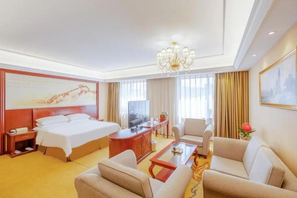 Bed in Vienna Hotel Guangdong Zhongshan Ancient Town Lighting Expo Center
