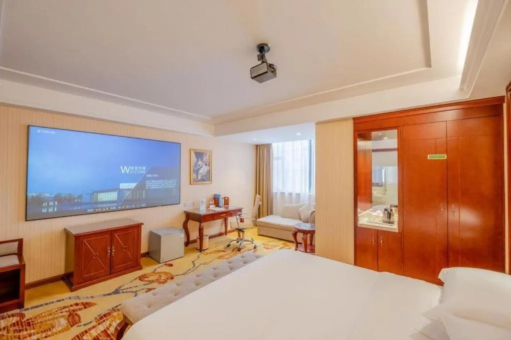 Bed in Vienna Hotel Guangdong Zhongshan Ancient Town Lighting Expo Center