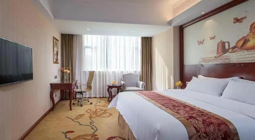 Bed in Vienna Hotel Guangdong Zhongshan Ancient Town Lighting Expo Center