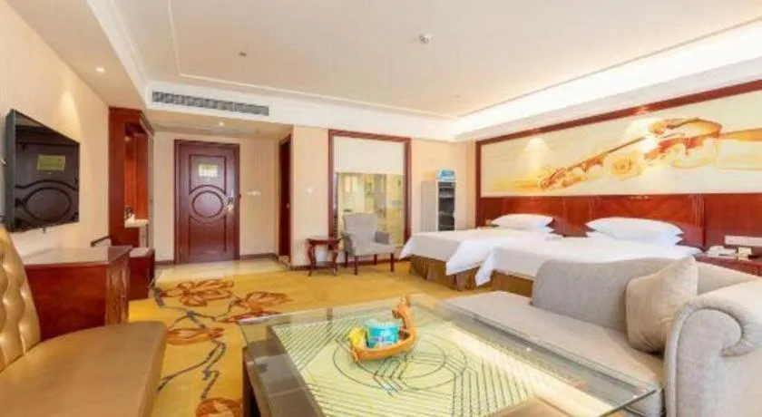 Bed in Vienna Hotel Guangdong Zhongshan Ancient Town Lighting Expo Center