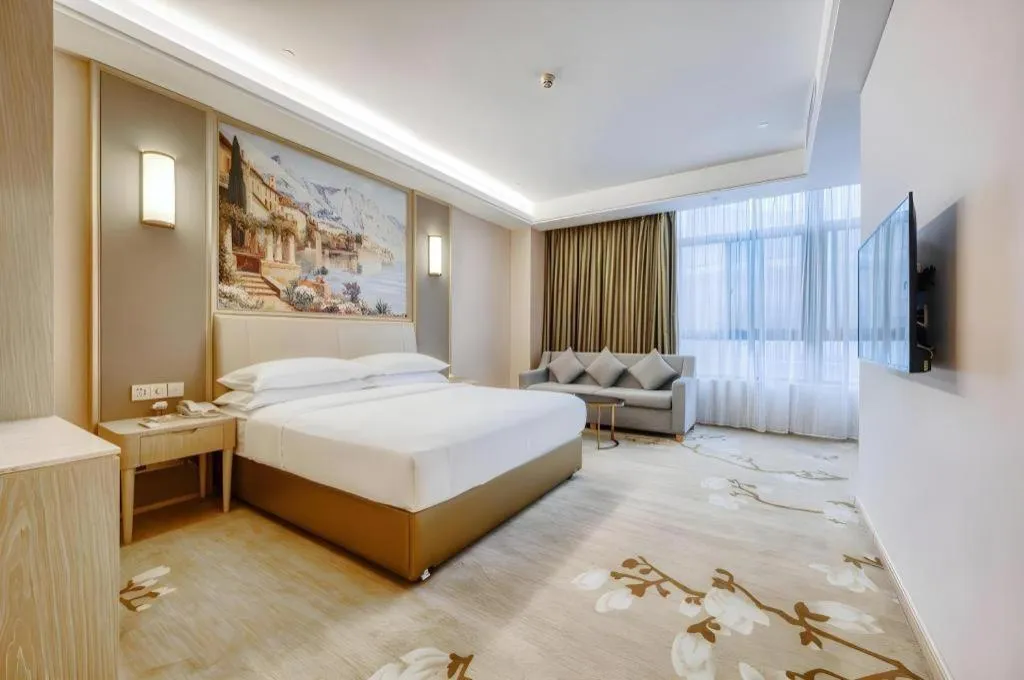 Bed in Vienna Hotel Fujian Fuqing Wanda Plaza