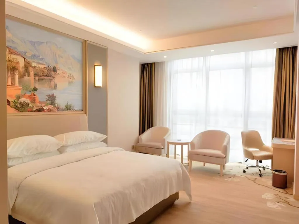 Bed in Vienna Hotel Fujian Fuqing Wanda Plaza