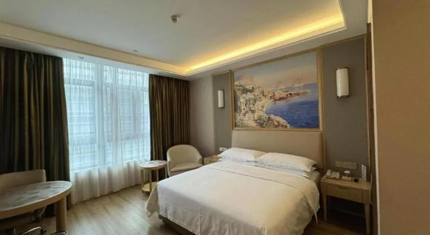 Bed in Vienna Hotel Fujian Fuqing Wanda Plaza