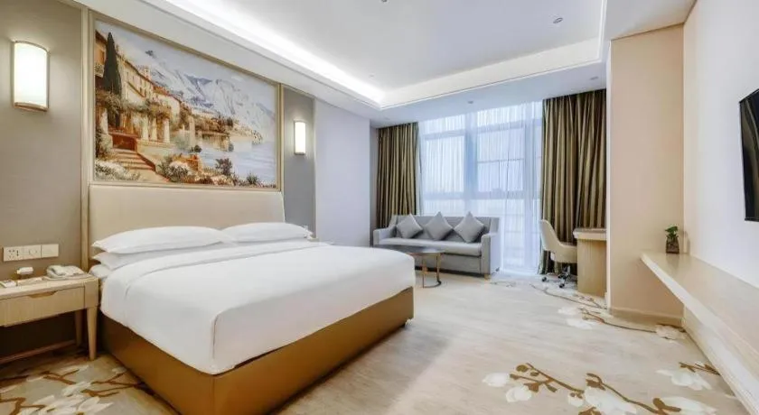 Bed in Vienna Hotel Fujian Fuqing Wanda Plaza