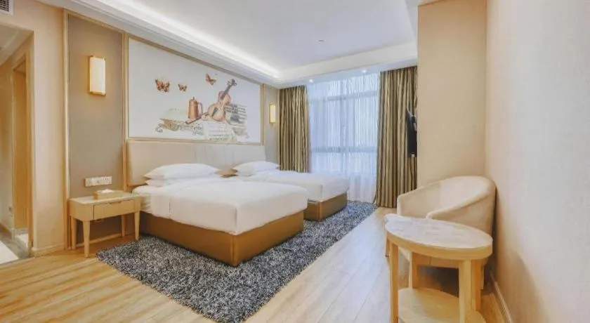 Bed in Vienna Hotel Fujian Fuqing Wanda Plaza