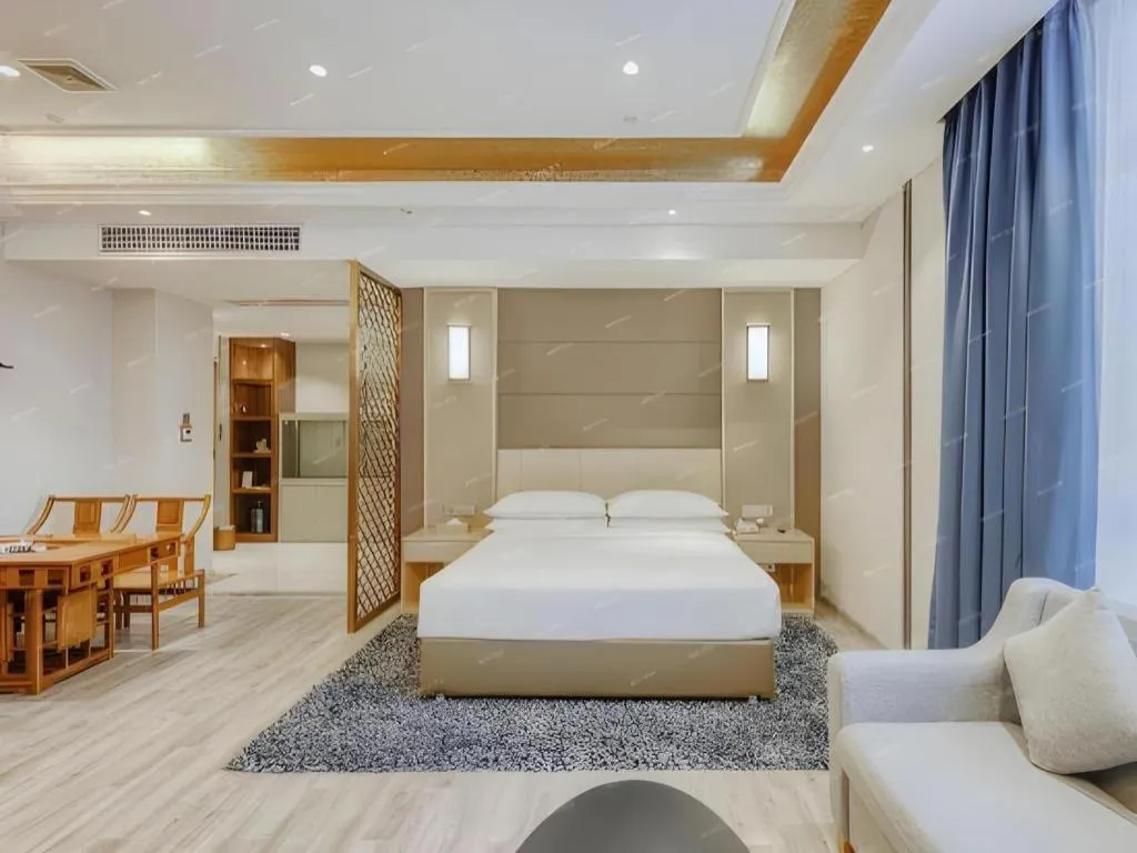 Bed in Vienna Hotel Fujian Fuqing Wanda Plaza