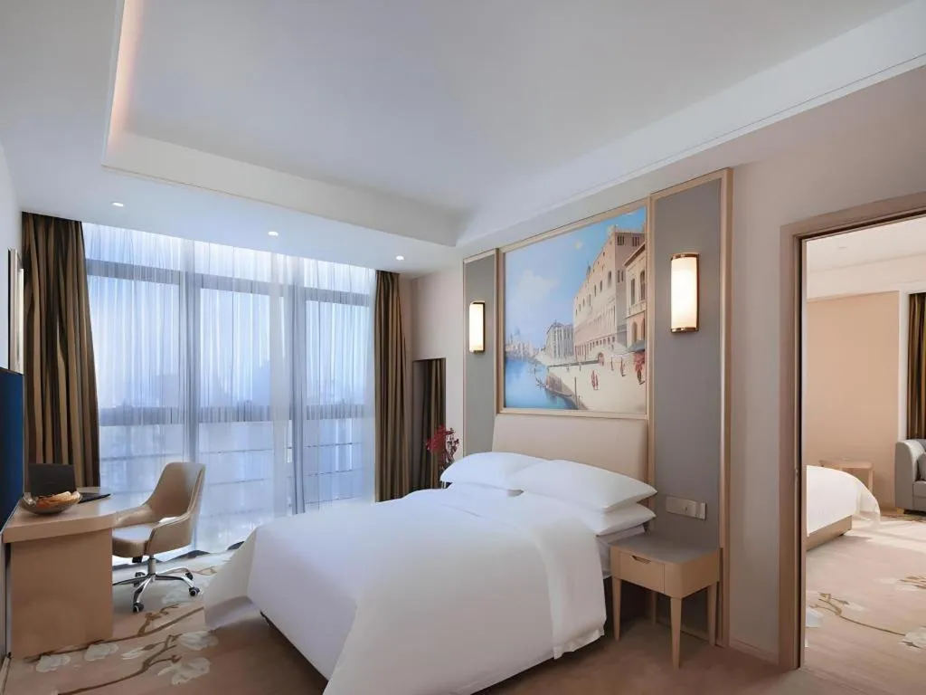 Bed in Vienna Hotel Fujian Fuqing Wanda Plaza