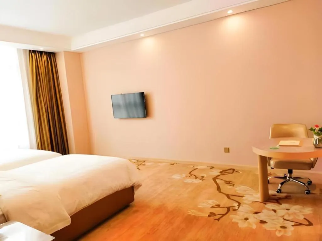 Bed in Vienna Hotel Fujian Fuqing Wanda Plaza