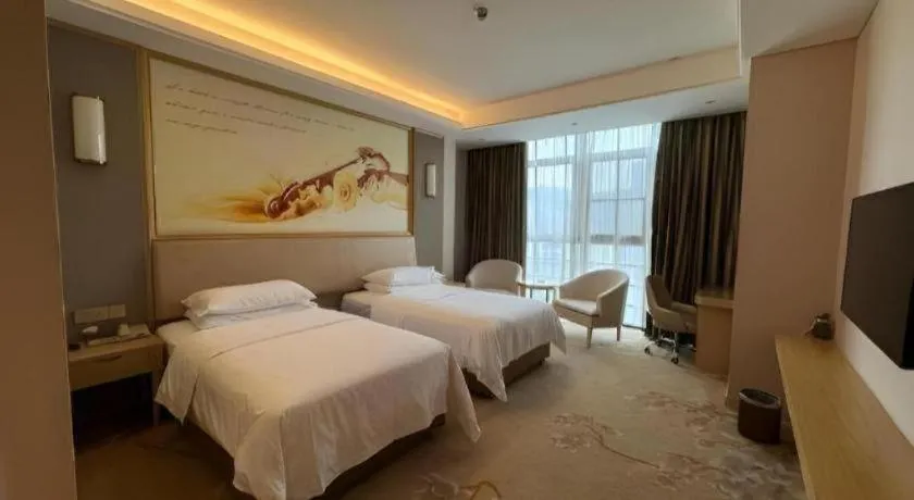 Bed in Vienna Hotel Fujian Fuqing Wanda Plaza
